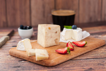 Assorted farm cheese with a cup of coffee - natural and healthy