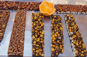 almond and hazelnuts bars on the table, Mediterranean sweets.