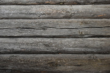 The pattern on the old and rotten planks, and wood frame