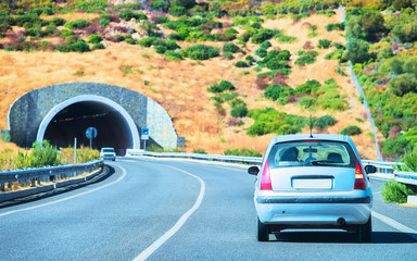 Car on road with underpass in Cagliari Sardinia