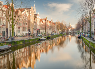 Amsterdam City Canal view with cloudy sky background