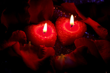 Valentine's day with frames of burning candles on a shiny background