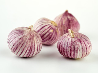Fresh garlic on market table closeup photo. Vitamin healthy food spice image. Spicy cooking ingredient picture.