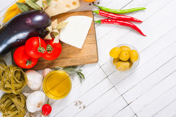 mediterranean food ingredients on white wood table