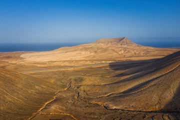 Montana Blanca and Montana Negra at Villaverde, Fuerteventura, Spain. Aerial drone view in october 2019