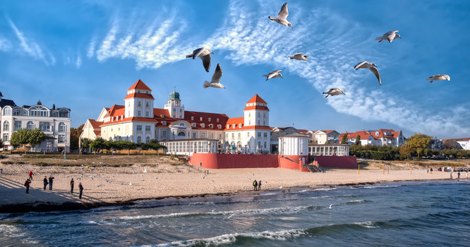 Beach promenade of R&uuml;gen-Binz with spa house and beautiful cloud formation on a sunny day. 