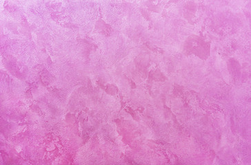 Pink seamless venetian stucco. Background and texture of decorative plaster.