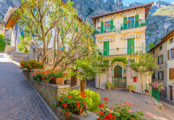 Fototapeta na wymiar Picturesque small town street view in Limone, Lake Garda Italy.