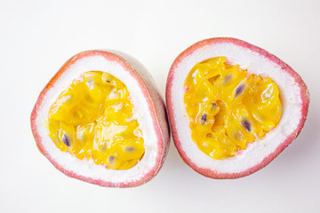 Closeup ripe juicy passion fruit close-up. The concept of exotic fruits, wholesome organic food, vegetarianism. Light pastel background.