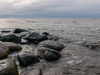 landscape with a rocky beach in the evening