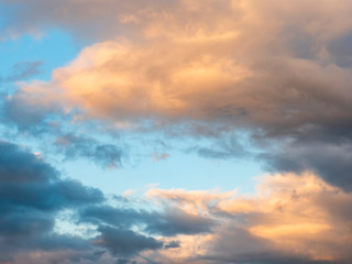 Naklejka na ściany i meble Beautiful color clouds with blue sky background. Nature weather. 