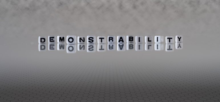 demonstrability concept represented by wooden letter tiles