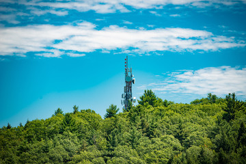 cell phone tower on hillside