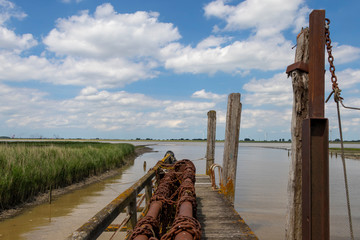 Dutch jetty and clouds