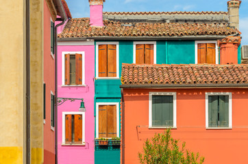 Beautiful window decorated with flowers in Italy