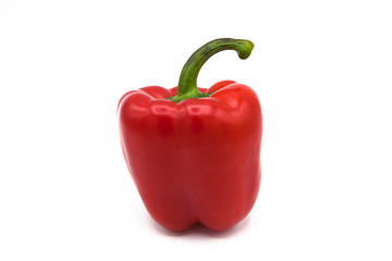 Bright red organic pepper isolated on white background.