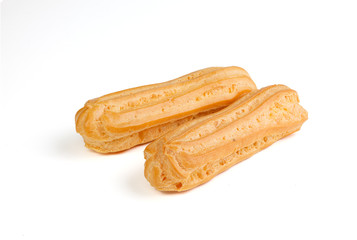 Eclairs isolated on white background. Delicious french dessert. Sweet dessert.