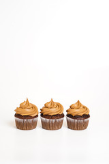Three chocolate cupcakes