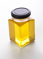 Mockup glass jar of fresh flower honey