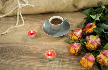 Fresh italian style coffee next to flower bouquet