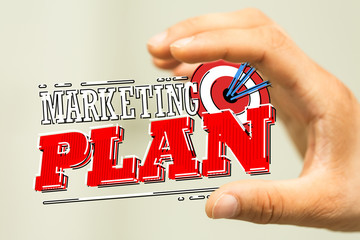 hand holding a target with darts hitting the center over white background. Concept of .