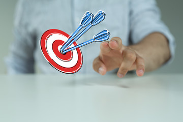 dart target arrow hitting on bullseye which is the ultimate goal that everyone wants.