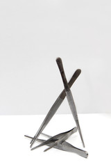 medical tweezers for surgery on a white background