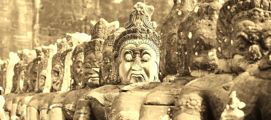 Magnificent stone figures at Angkor Thom South Gate
