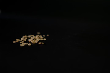 Oats flakes in black background healthy food