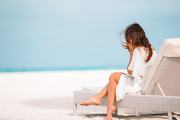 Young beautiful woman on beach vacation on Caribs