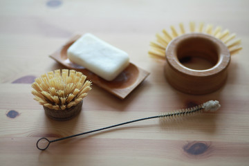 Solid soap and compostable dish brush in a zero waste household