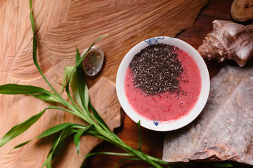 Strawberry and banana smoothie with chia in the cup
