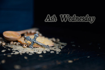 Christian cross necklace on darck background - as a symbol of the beginning of Great Lent, Ash Wednesday