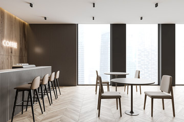 Modern coffee shop interior with bar and tables