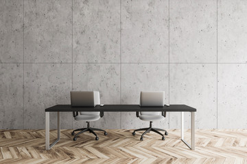 Computer table in concrete wall loft office