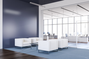 Blue office lounge area corner with armchairs