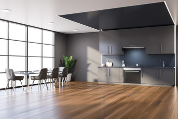 Blue and gray kitchen corner, counters and table