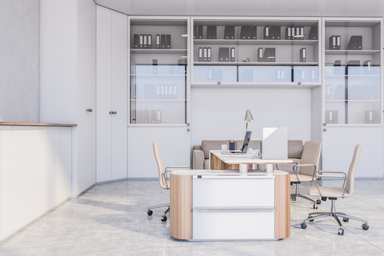 White boss office interior with beige sofa