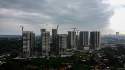 Fototapeta premium Aerial View or Drone Shot. Apartment buildings are under construction after rain