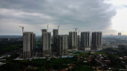 Aerial View or Drone Shot. Apartment buildings are under construction after rain
