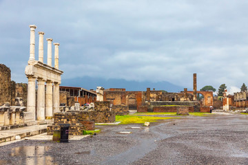 Obraz premium Ruins of Ancient Roman city of Pompei, Italy. Pompei was destroyed and buried with ash after Vesuvius eruption in 79 AD