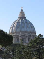 View of the dome of St. Peter's Basilica as seen from the Pinacoteca courtyard outside of the Vatican City museums 