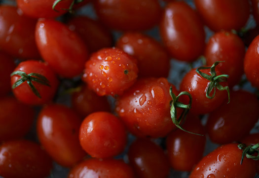 Close-up view of red ripe tomatoes while cleaning