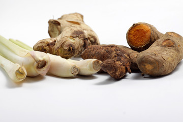 Close - up shot of herbs, gingger, tumeric,  galangal, lemon grass that can be used for cooking as seasoning also for medical purpose as traditional medicine. 