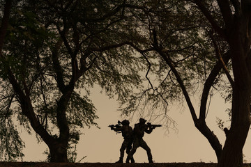 silhouette action soldiers
