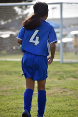 Girl Playing Soccer