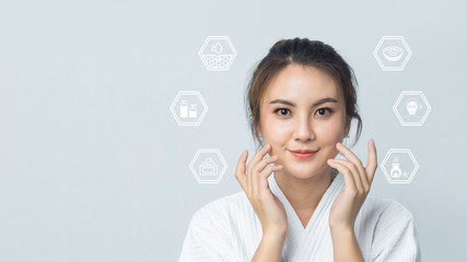 Asian woman facial skin care items treatment, Beautiful girl in spa dress, Asian girl beauty facial face care.