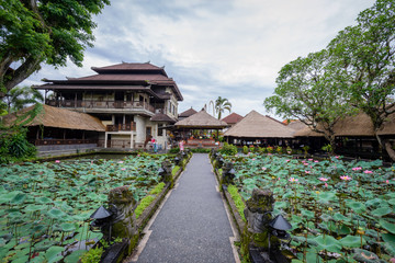 Fototapeta premium Balinese architectural details and sculptures in a local temple, Bali Indonesia