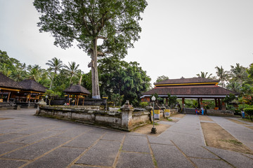 Balinese sculptures and architectural details in a temple, antique and rich of local culture