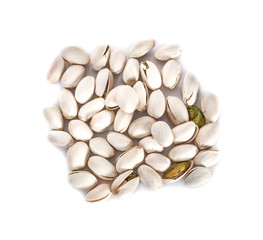 Pistachio in closeup isolated on white background topview